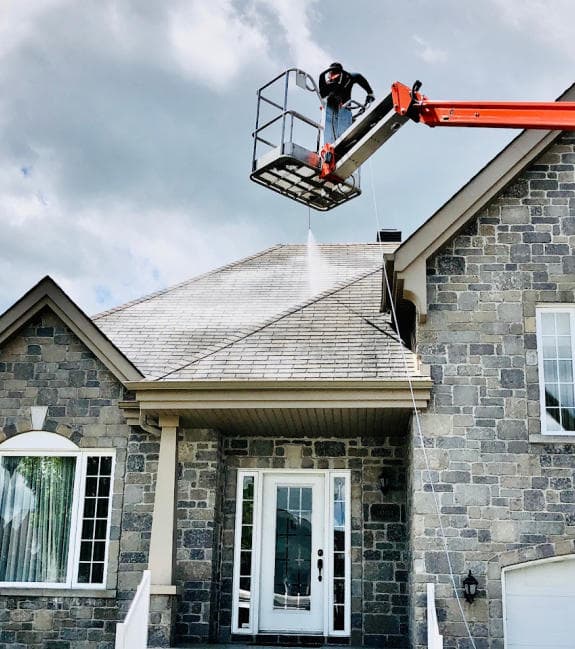 home being sprayed with shingle saver detroit gonano